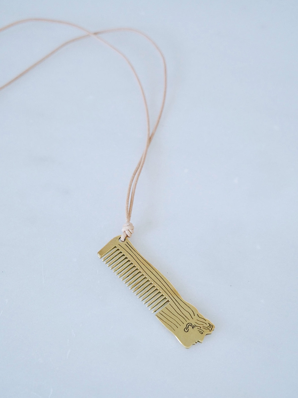 Face Comb Necklace