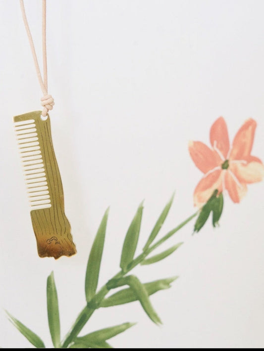 Face Comb Necklace